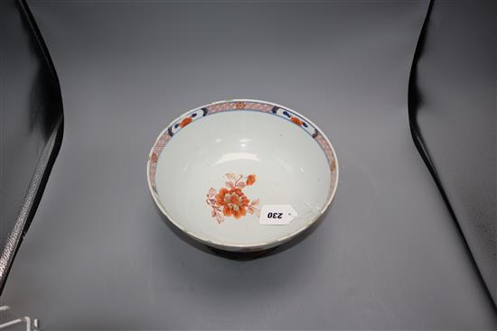 An 18th century Chinese verte Imari bowl on wood stand, c.1740, diameter 26cm